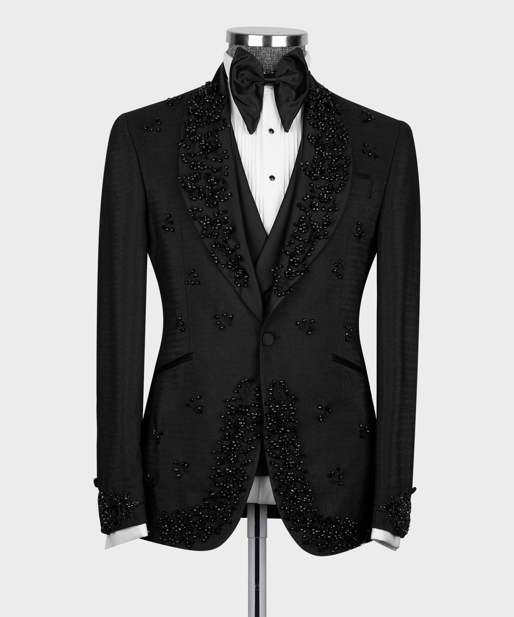 Black tuxedo jacket and vest set with crystal embellishments and bow tie