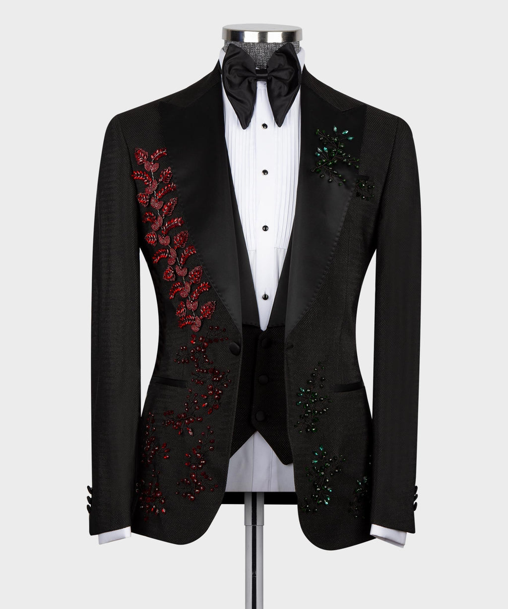 Black tuxedo with red/green crystal floral embroidery, black bow tie, white shirt