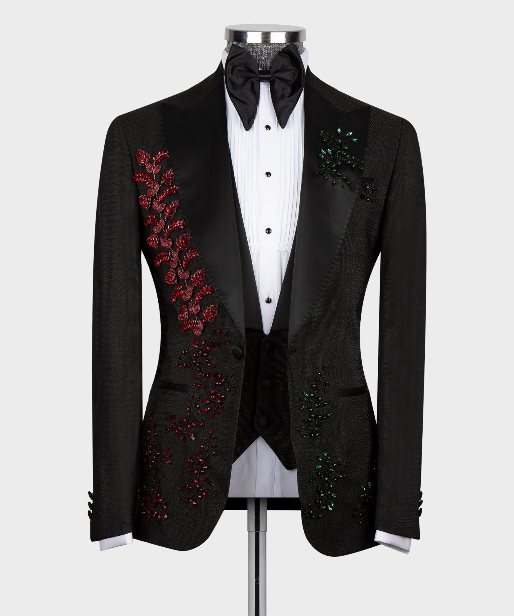 Black tuxedo with red/green crystal floral embroidery, black bow tie, white shirt
