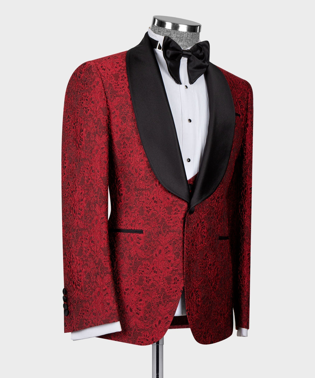 Red tuxedo jacket with black satin lapel, bow tie, and front-button waistcoat