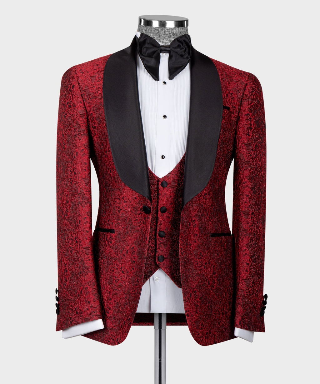 Red jacquard tuxedo jacket with black satin lapels, vest, and black bow tie