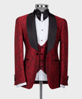 Red patterned tuxedo jacket with satin black shawl collar, bow tie, and matching waistcoat