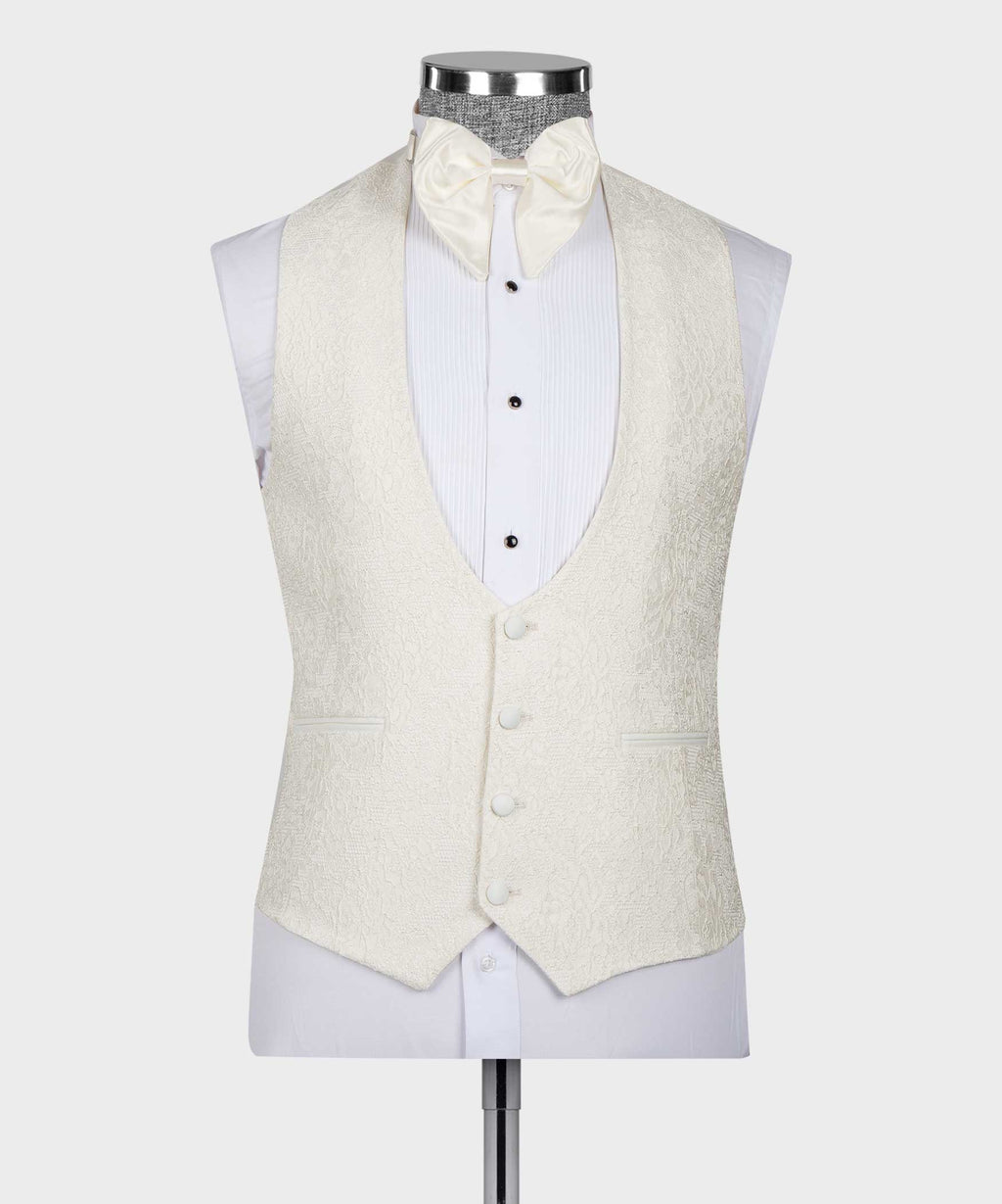 Cream tuxedo vest with four-button front, bow tie and white striped shirt