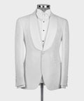 White tuxedo jacket with satin shawl lapels and matching vest front, covered buttons