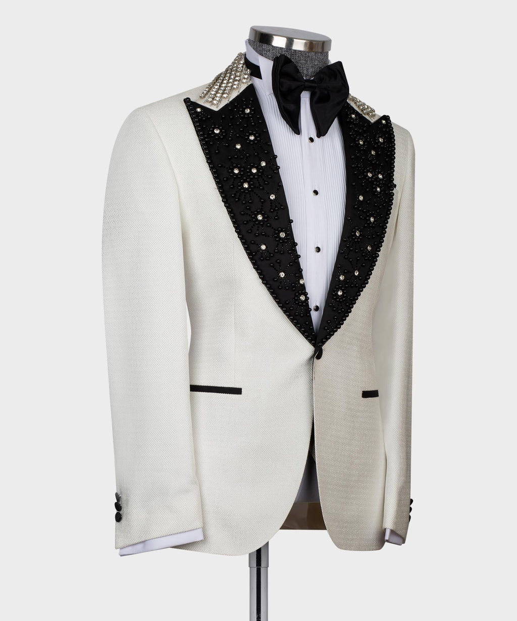 White tuxedo jacket front view with jeweled black lapels and black bow tie