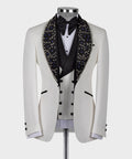 White tuxedo jacket with black satin bow tie and blue crystal gem trim lapels