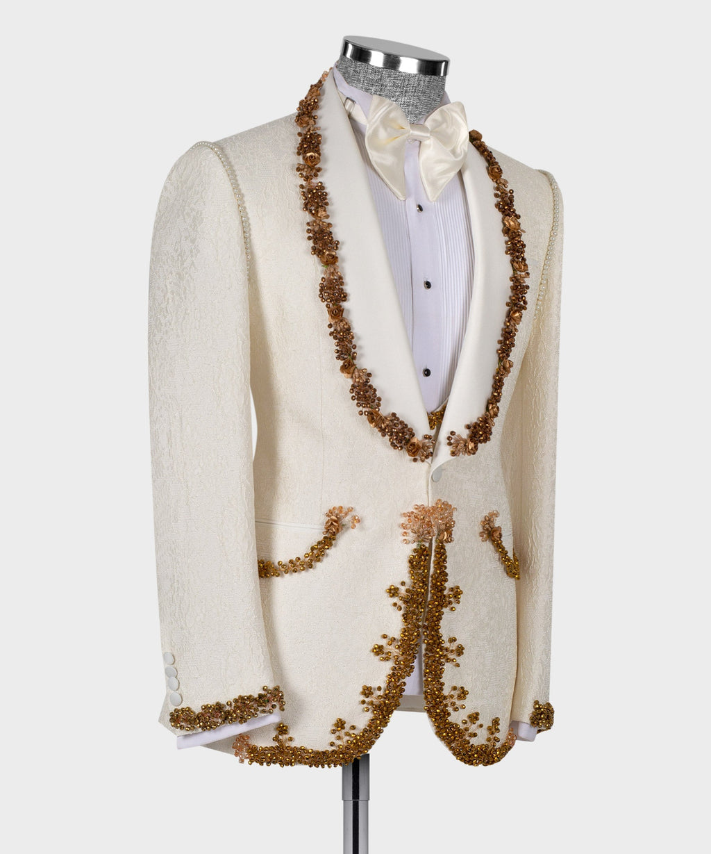 Cream tuxedo jacket set with gold embellished lapels and cuffs over white shirt