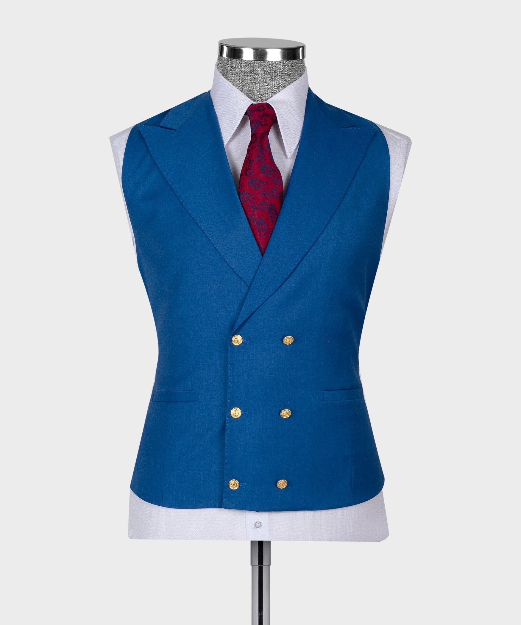 Blue waistcoat (vest) with gold buttons and white shirt collar