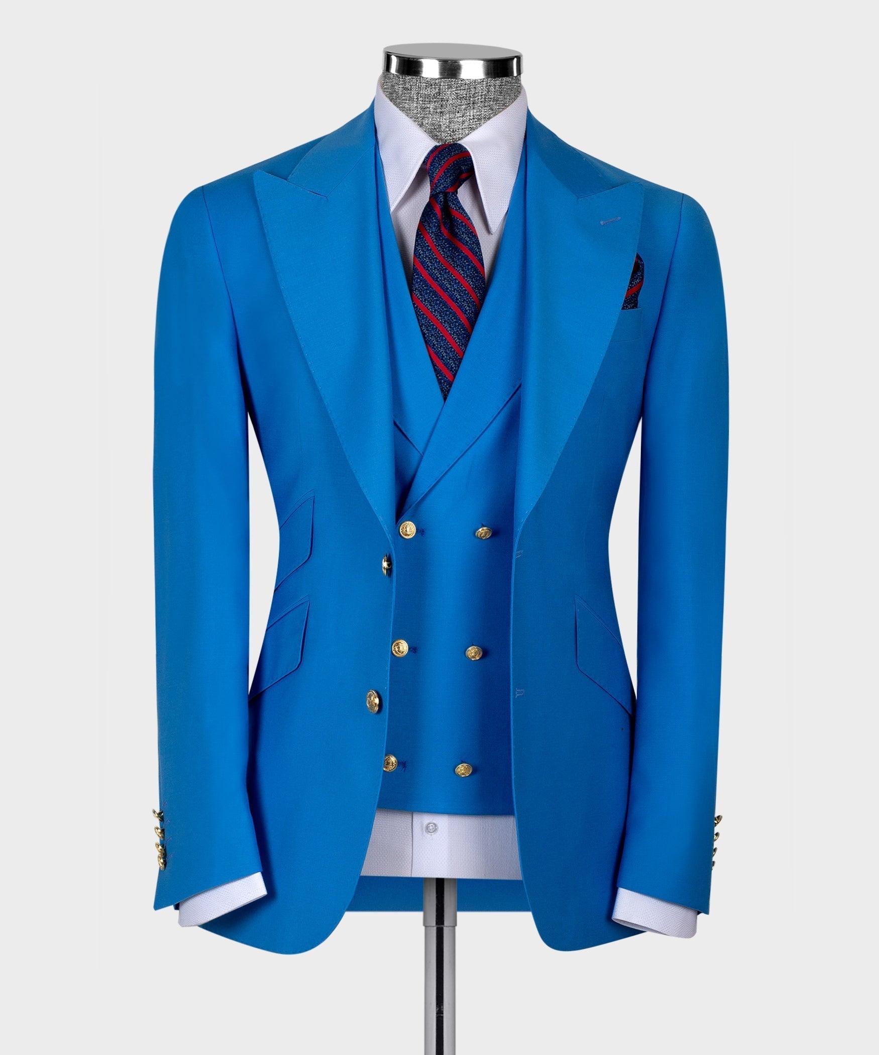 Light blue suit jacket with gold buttons, notch lapels, and striped pocket square