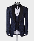 Navy double-lapel tuxedo jacket with black lapels, matching vest, white shirt, bow tie