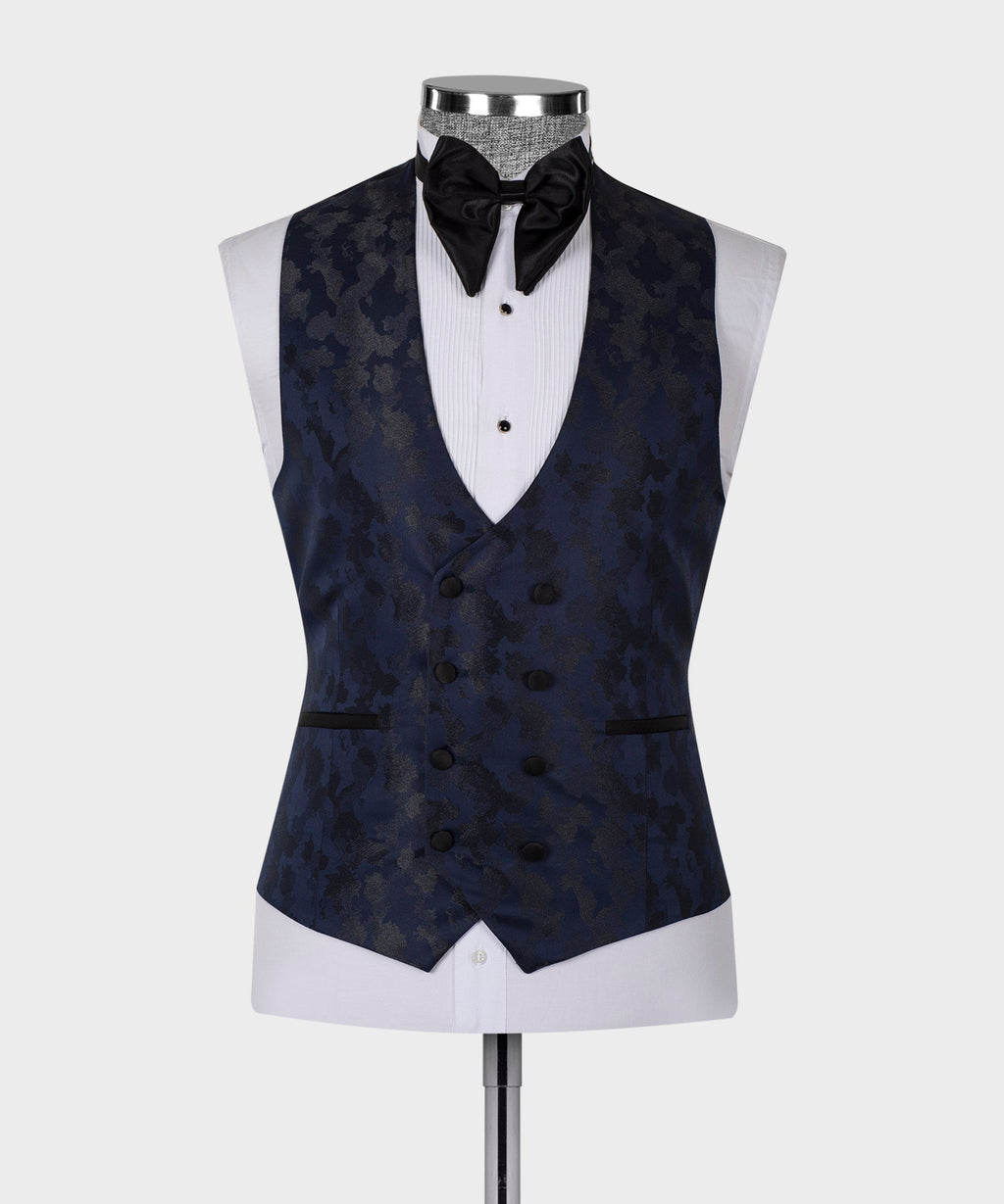 Navy tuxedo waistcoat with black buttons over white shirt panel; bow tie