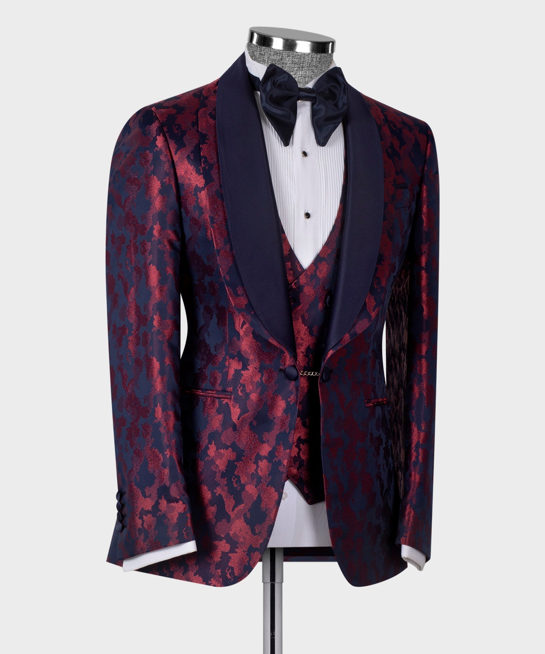 Dark blue tuxedo jacket with burgundy patterned vest front and double-breasted buttons