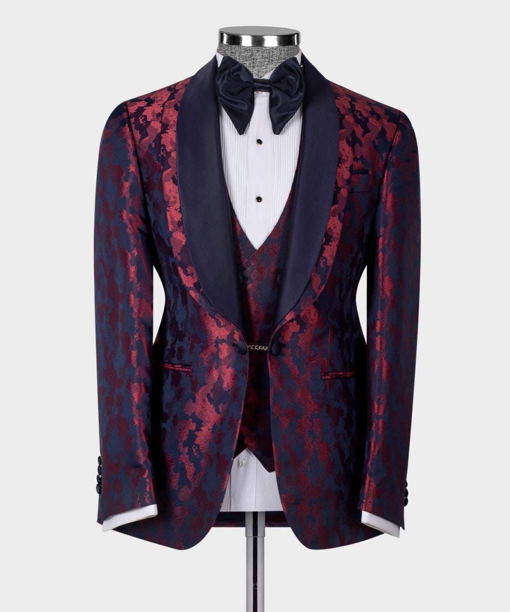Dark blue double-lapeled tuxedo jacket with burgundy pattern, satin bow tie, vest