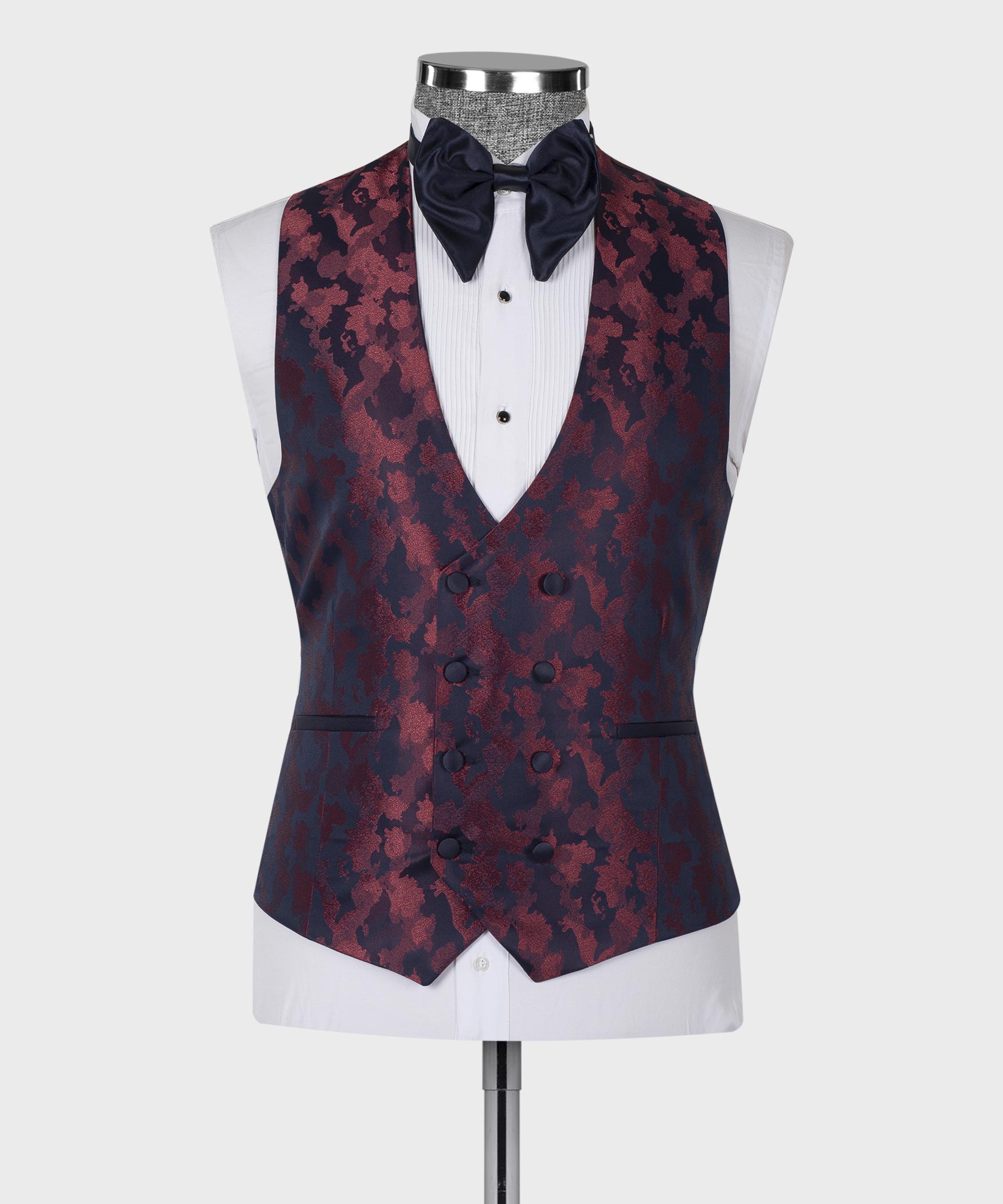 Burgundy-and-dark-blue patterned tuxedo waistcoat with bow tie and white shirt front