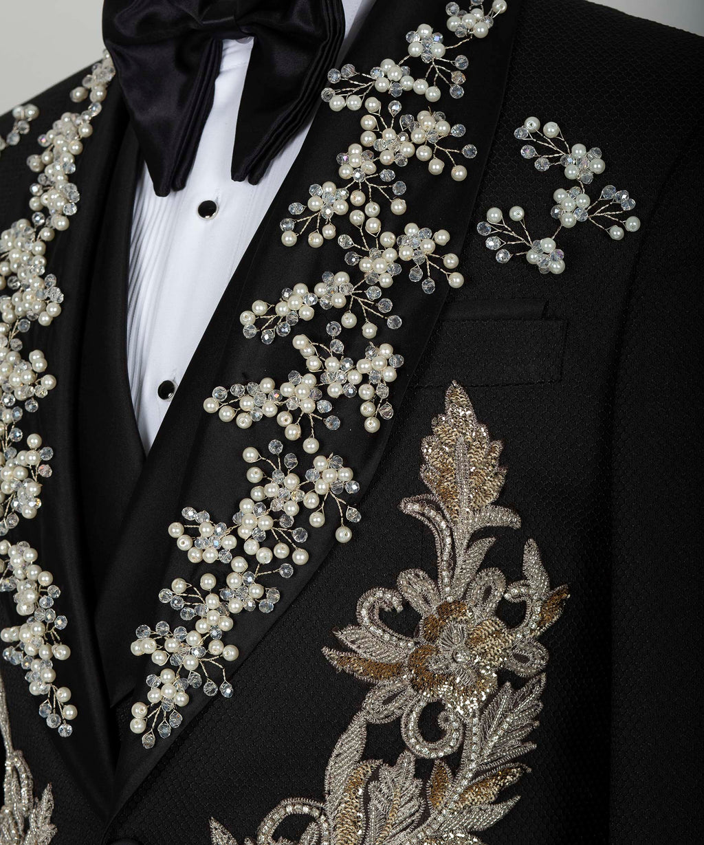 Black tuxedo jacket sleeve and chest detail with pearl-and-crystal floral embroidery