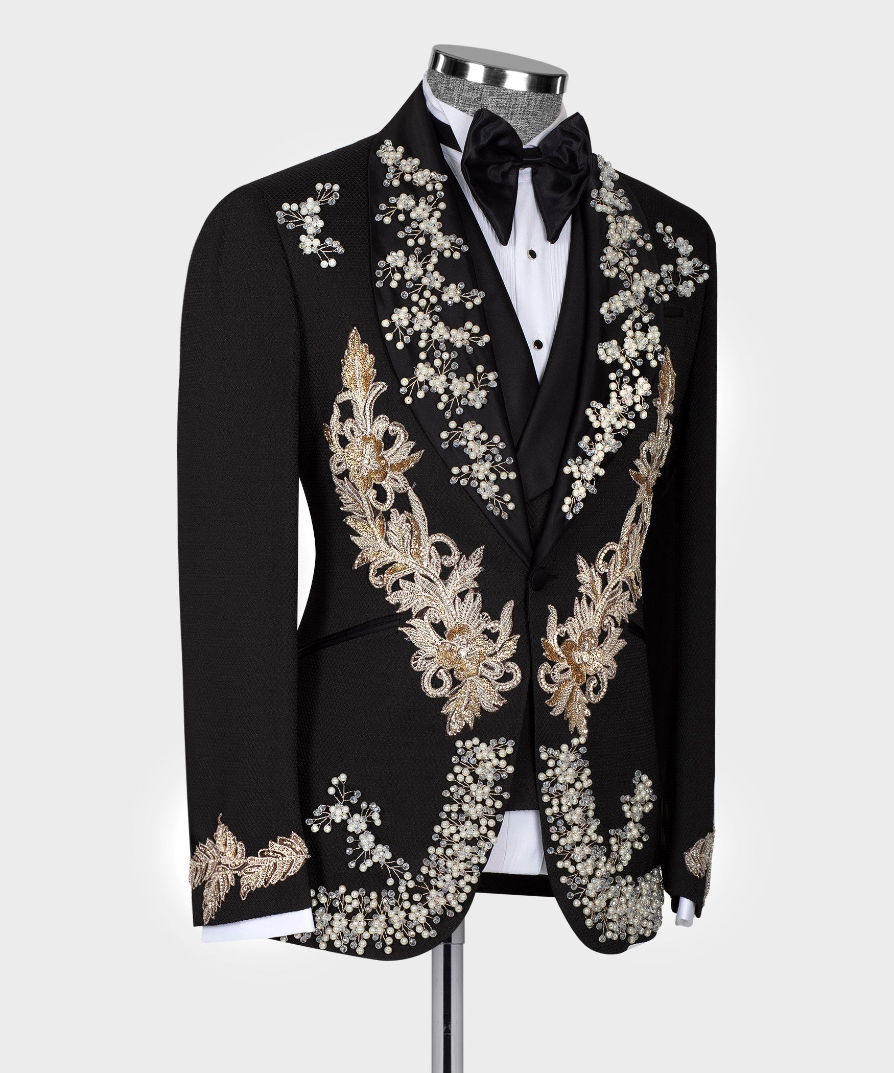 Black tuxedo jacket with detailed pearl sprays and gold floral embroidery on lapels