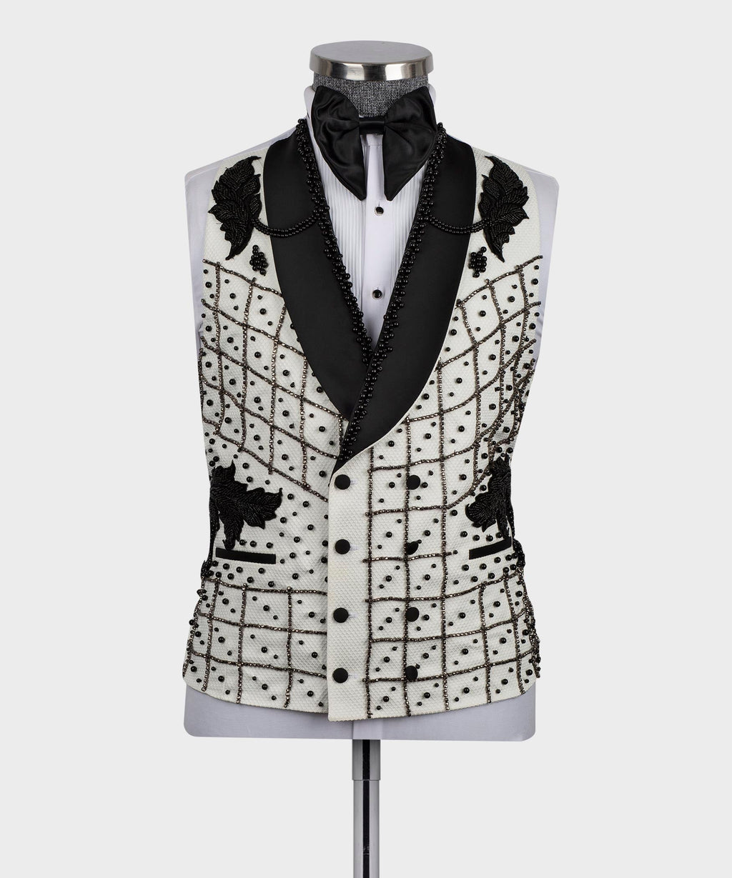 White tuxedo jacket with black vest panels, bow tie, and crystal bead grid trim