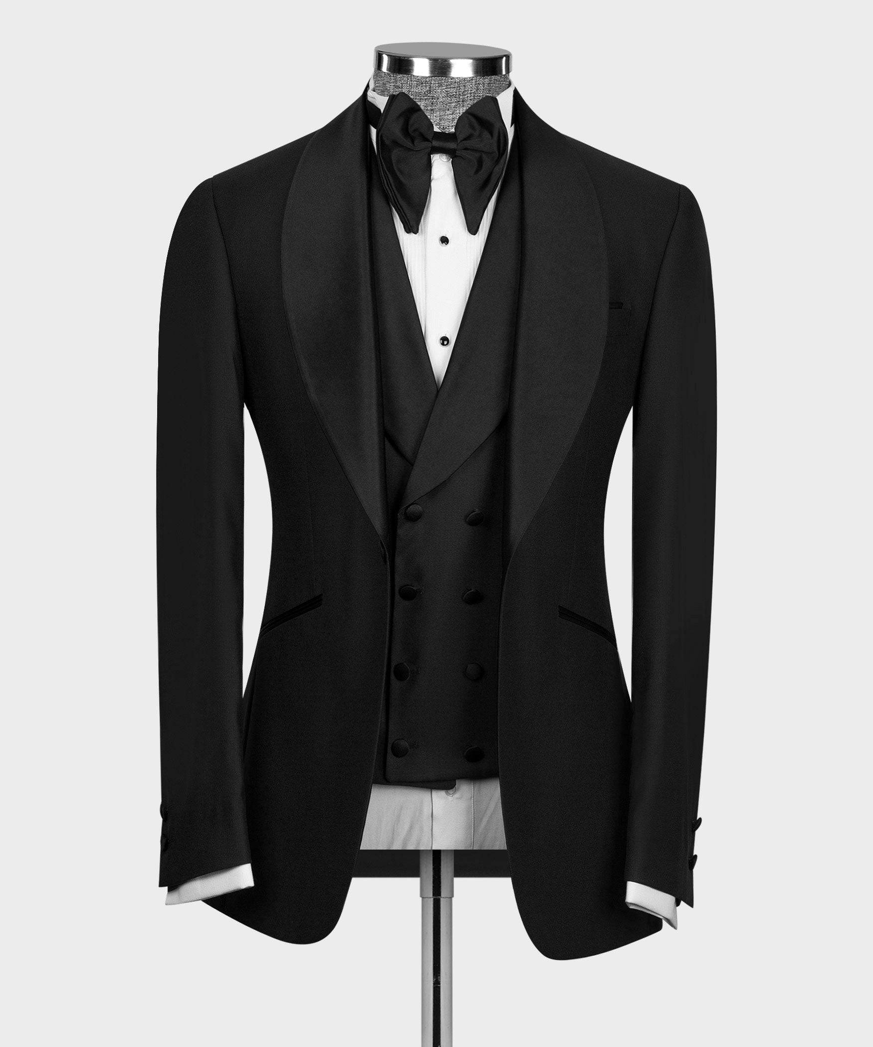 Black tuxedo jacket with satin lapels, black bow tie, and white vest buttons
