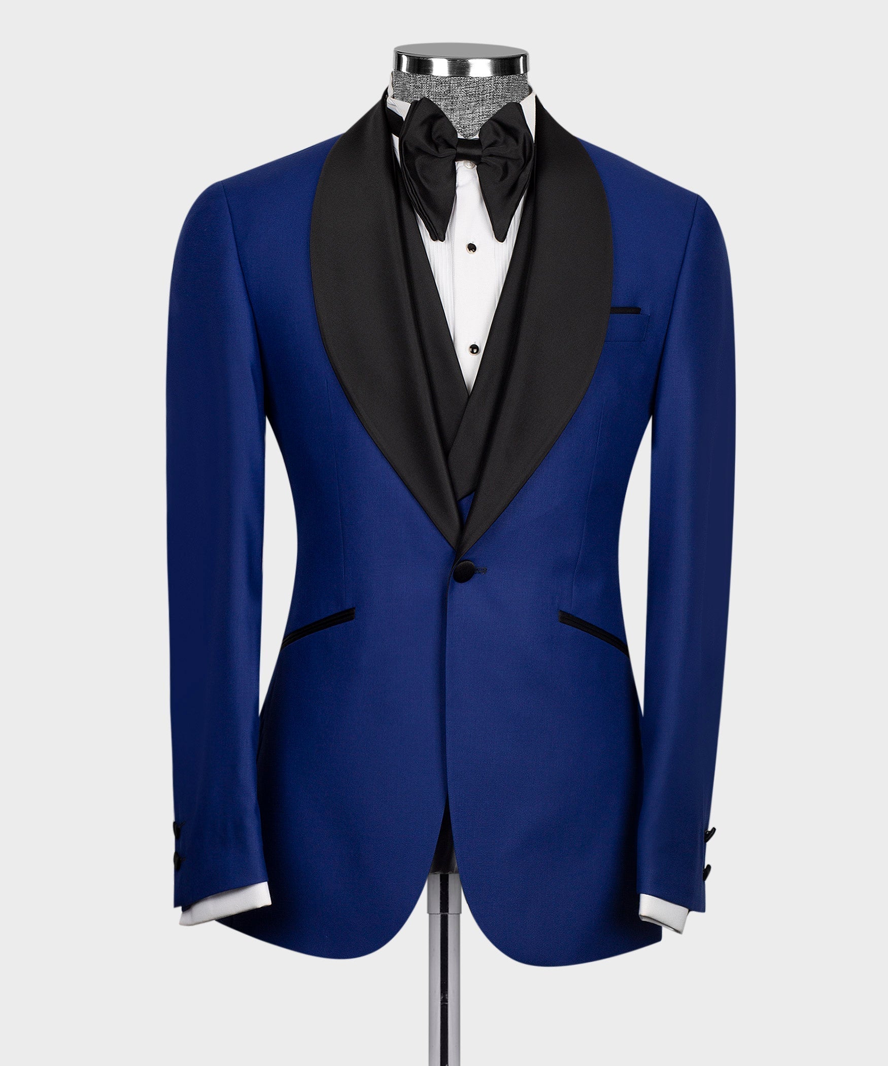 Blue tuxedo suit jacket with black satin lapels and bow tie, front view