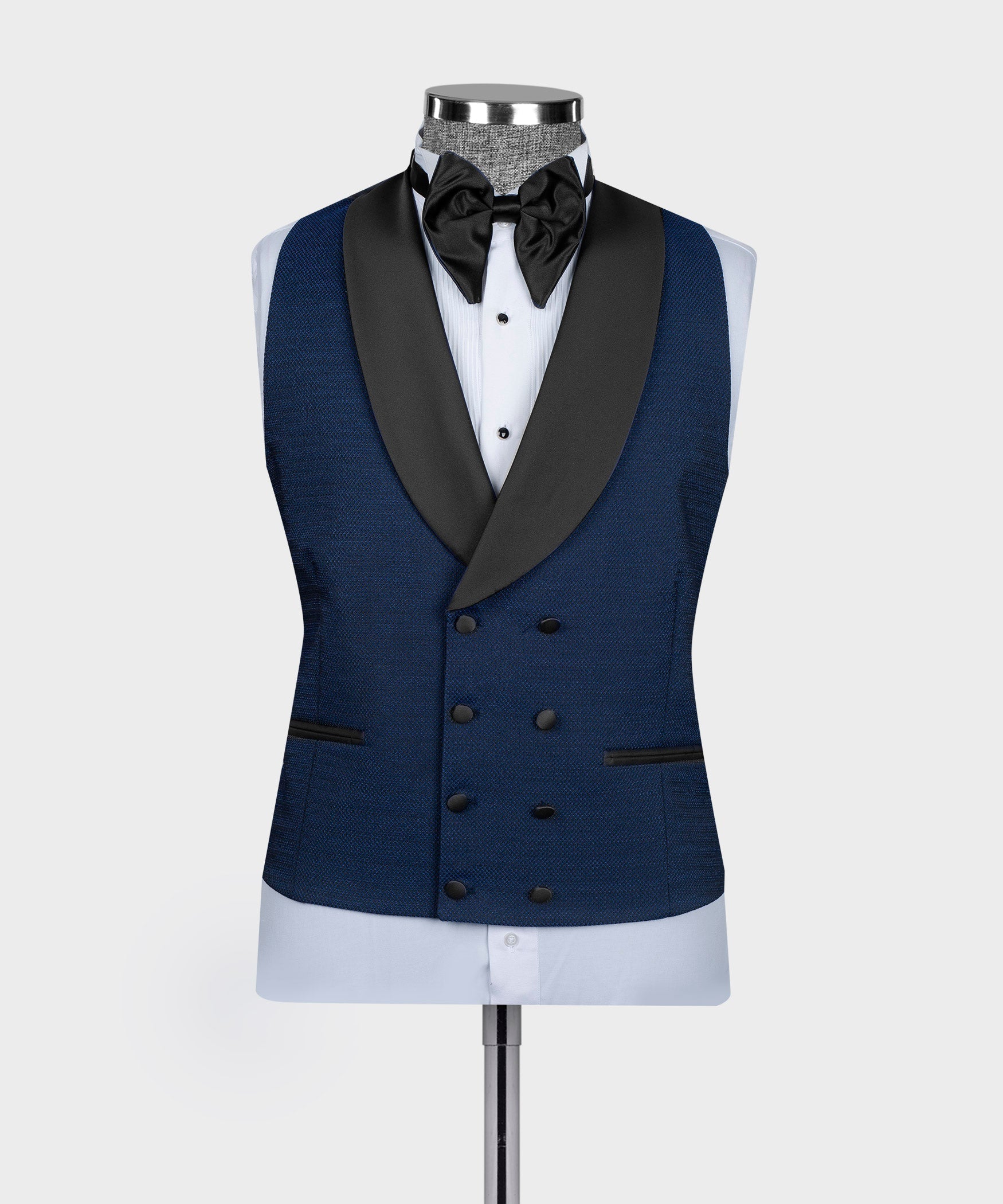 Blue tuxedo waistcoat with black satin lapels, bow tie and white dress shirt