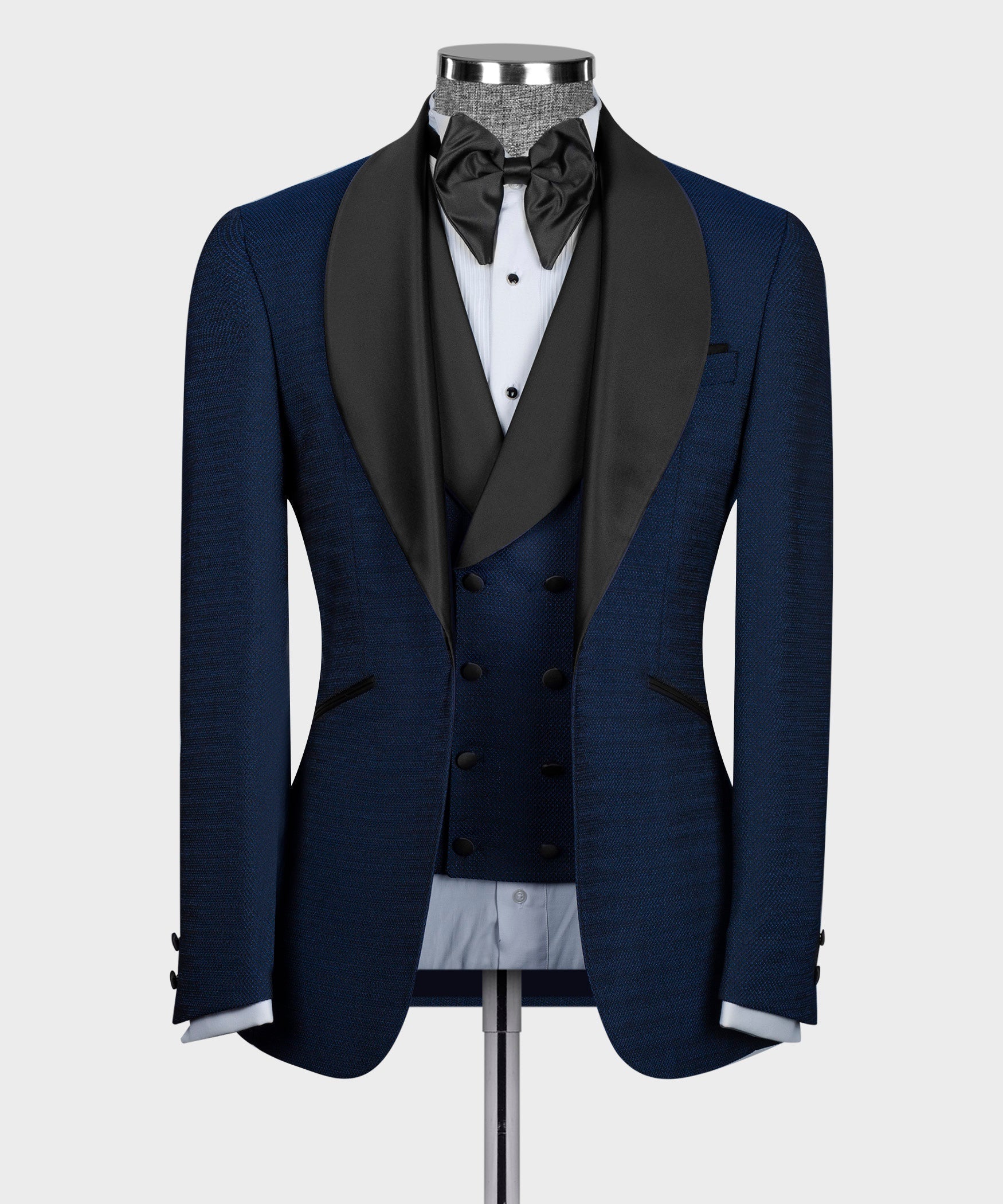 Blue tuxedo jacket with black satin lapels and bow tie, double-breasted vest