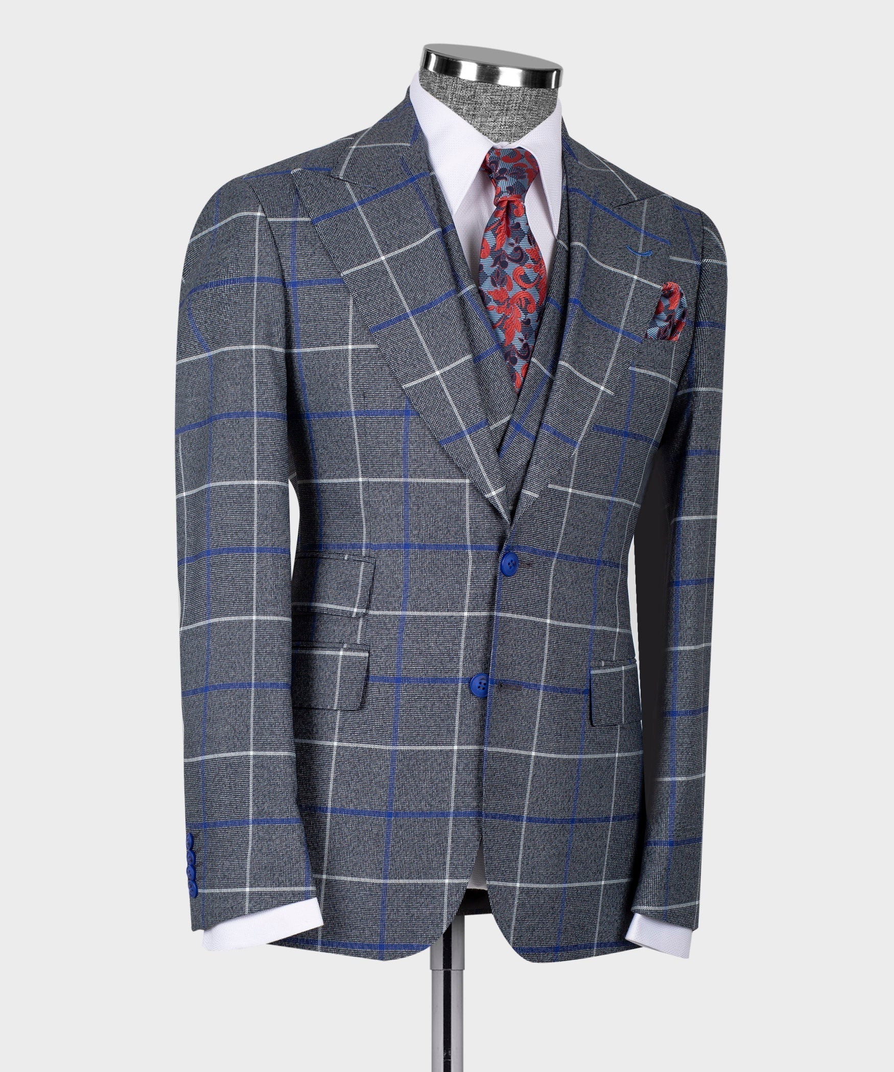 Dark gray suit jacket and vest set with blue grid, red patterned tie and pocket square