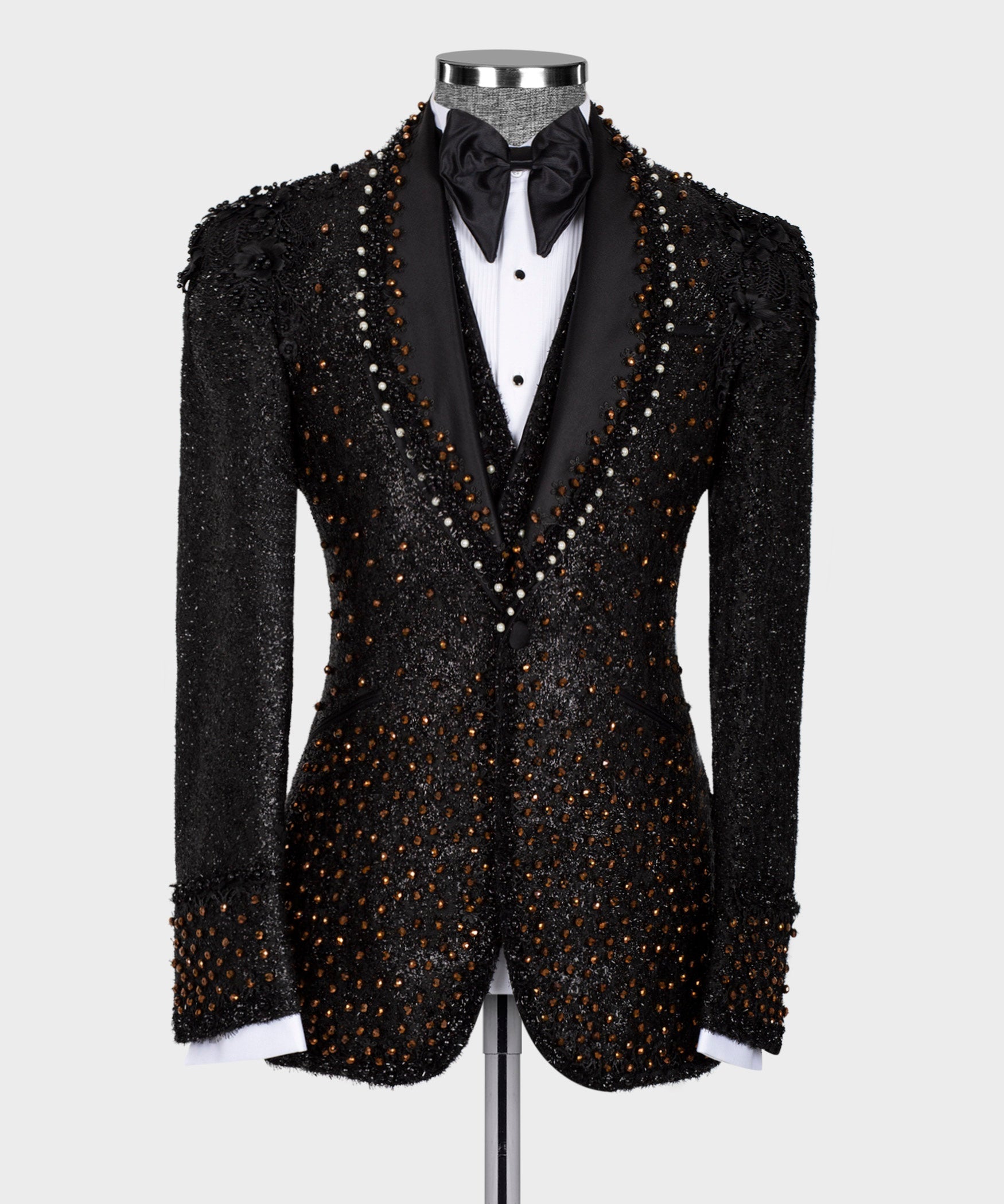 Front view black tuxedo jacket with ornate bead-and-pearl trim and satin bow tie
