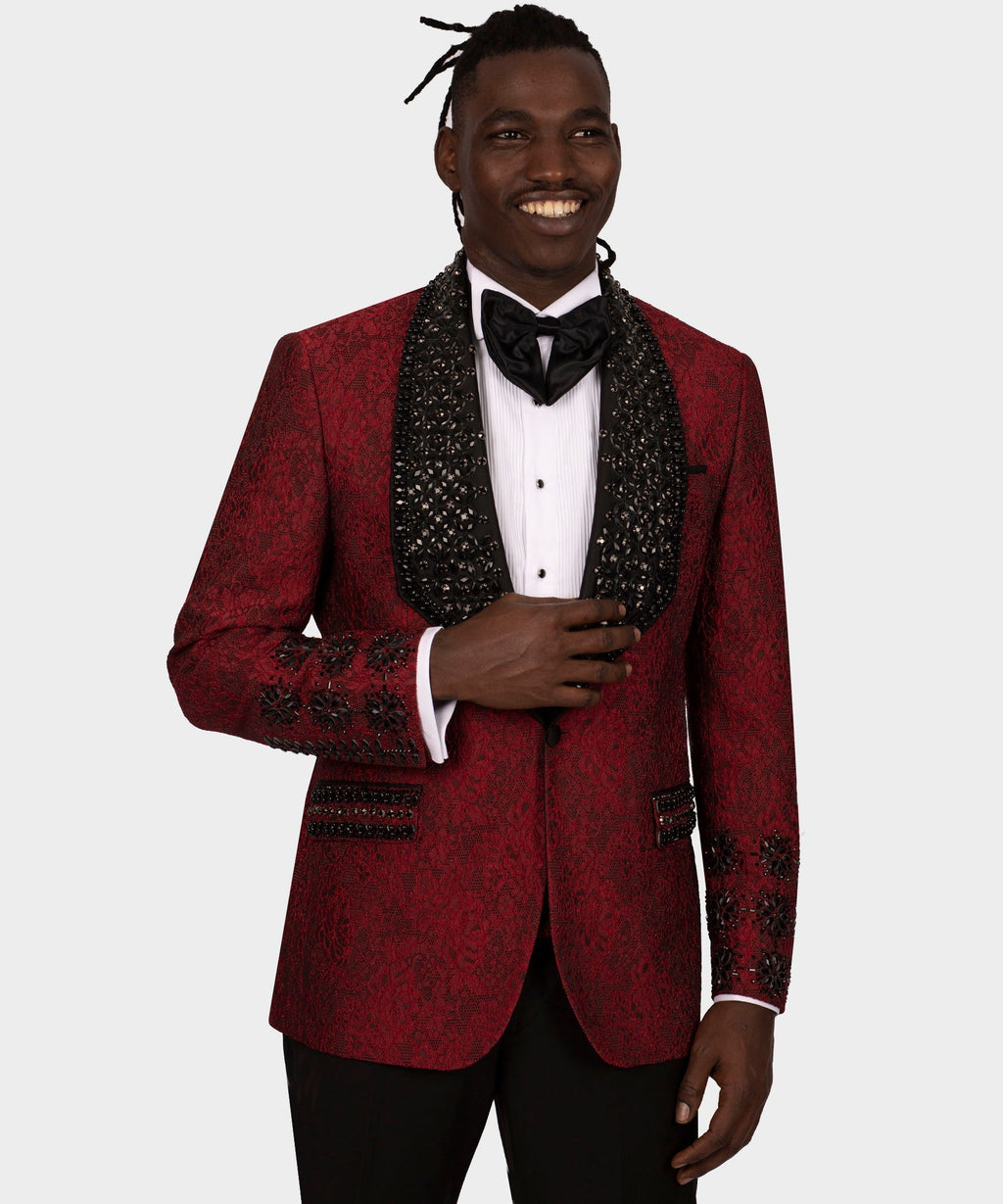 Red tuxedo jacket with black textured vest, black bow tie, and white dress shirt