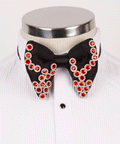 Beaded bow tie with red crystal embellishments on black fabric