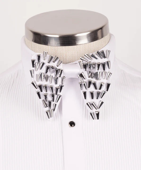 Koss Atelier white silk bow tie with silver spike embellishments, worn on a white pleated dress shirt.
