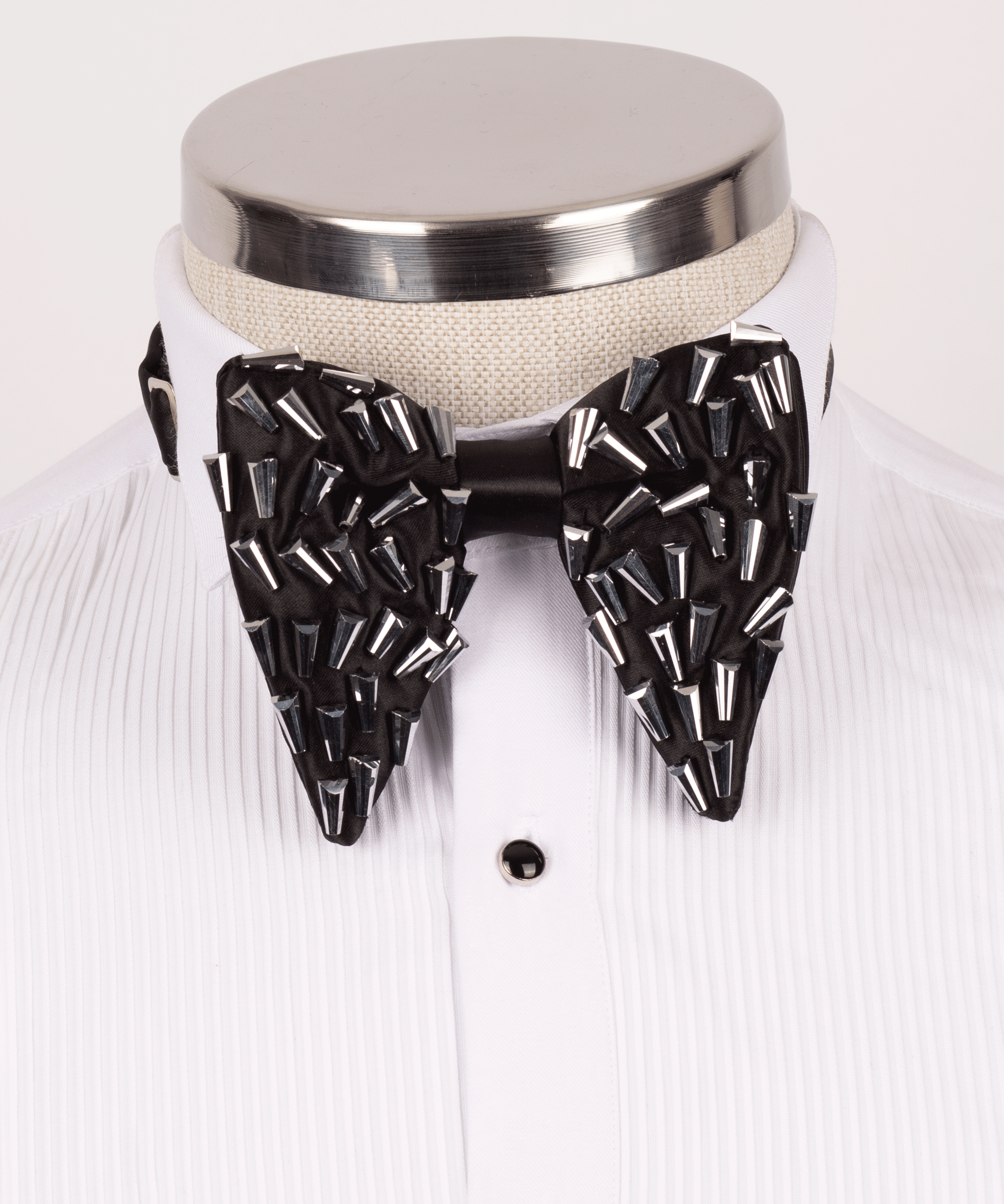 Black beaded bow tie with glossy metallic bead accents.