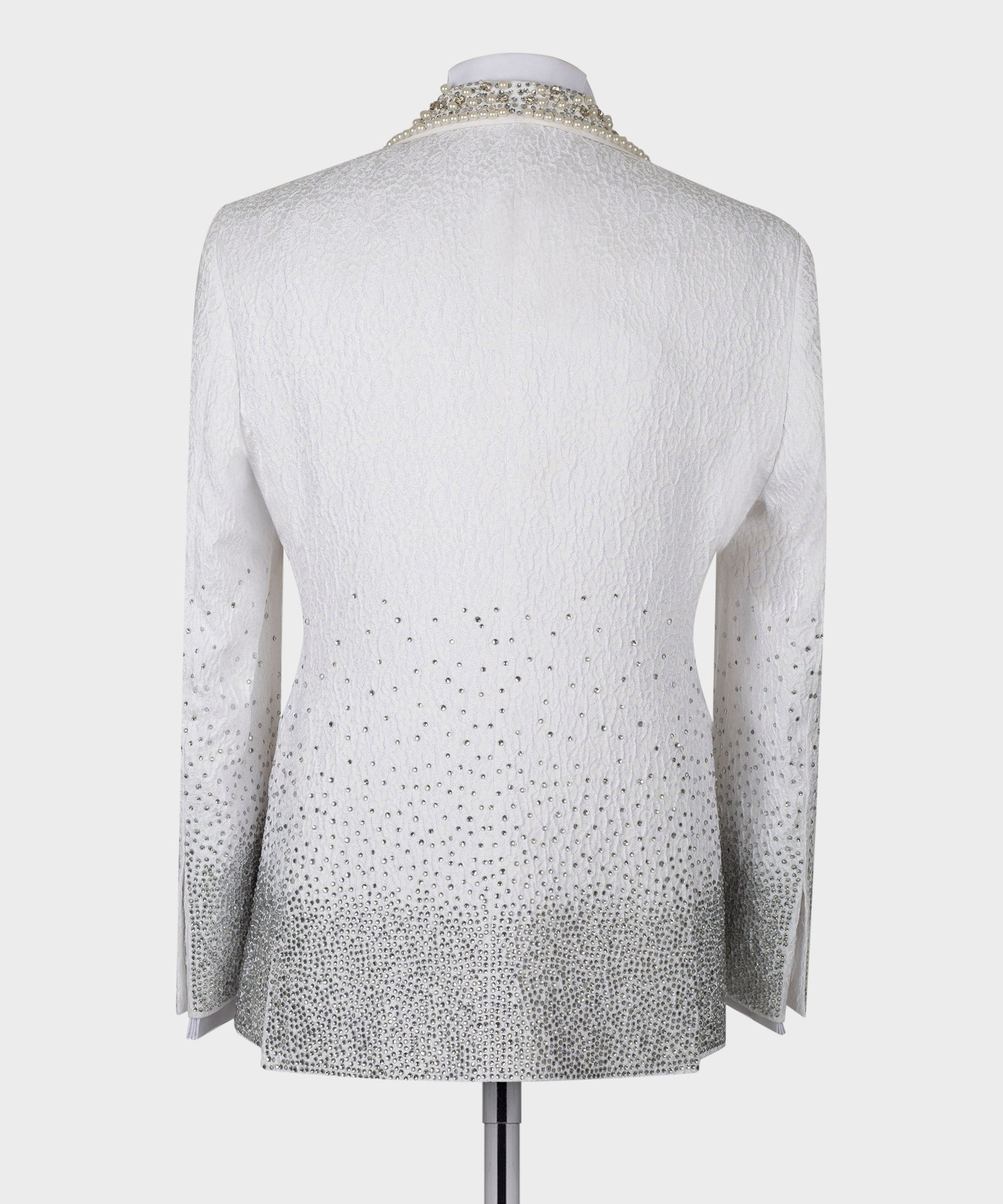 Back view white tuxedo jacket with gold-toned jeweled trim and dotted sparkle fabric