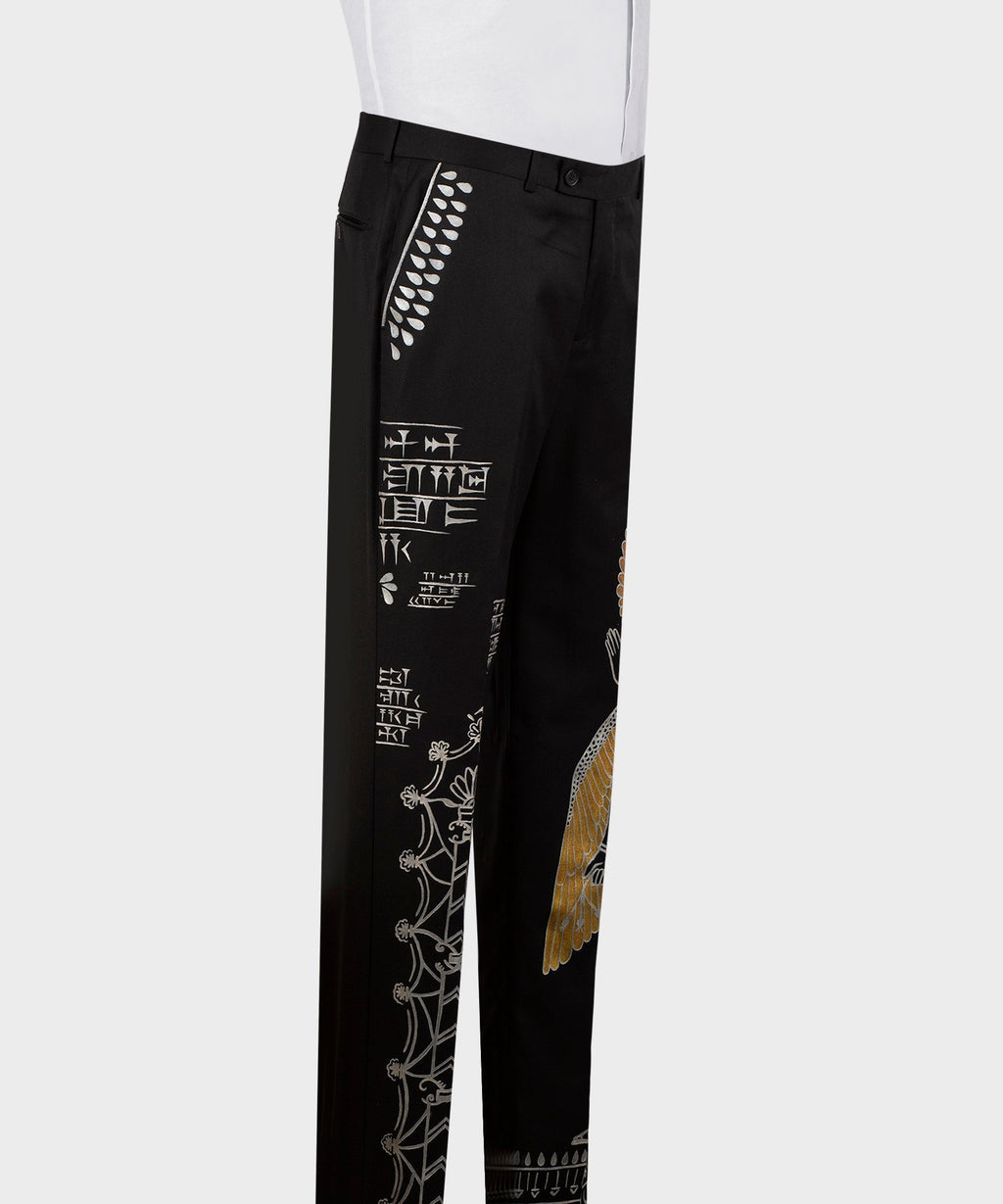 Black embroidered tuxedo trousers with white stitch designs along the side leg