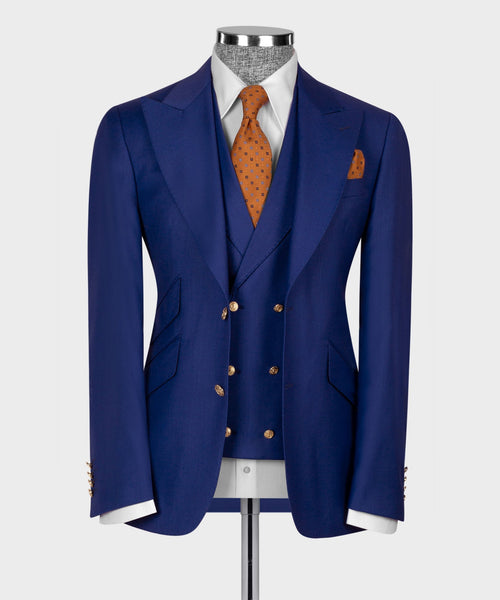 Blue men’s vest suit jacket with waistcoat and patterned orange tie
