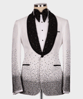 Black and white tuxedo jacket with gem-studded satin lapels and black bow tie
