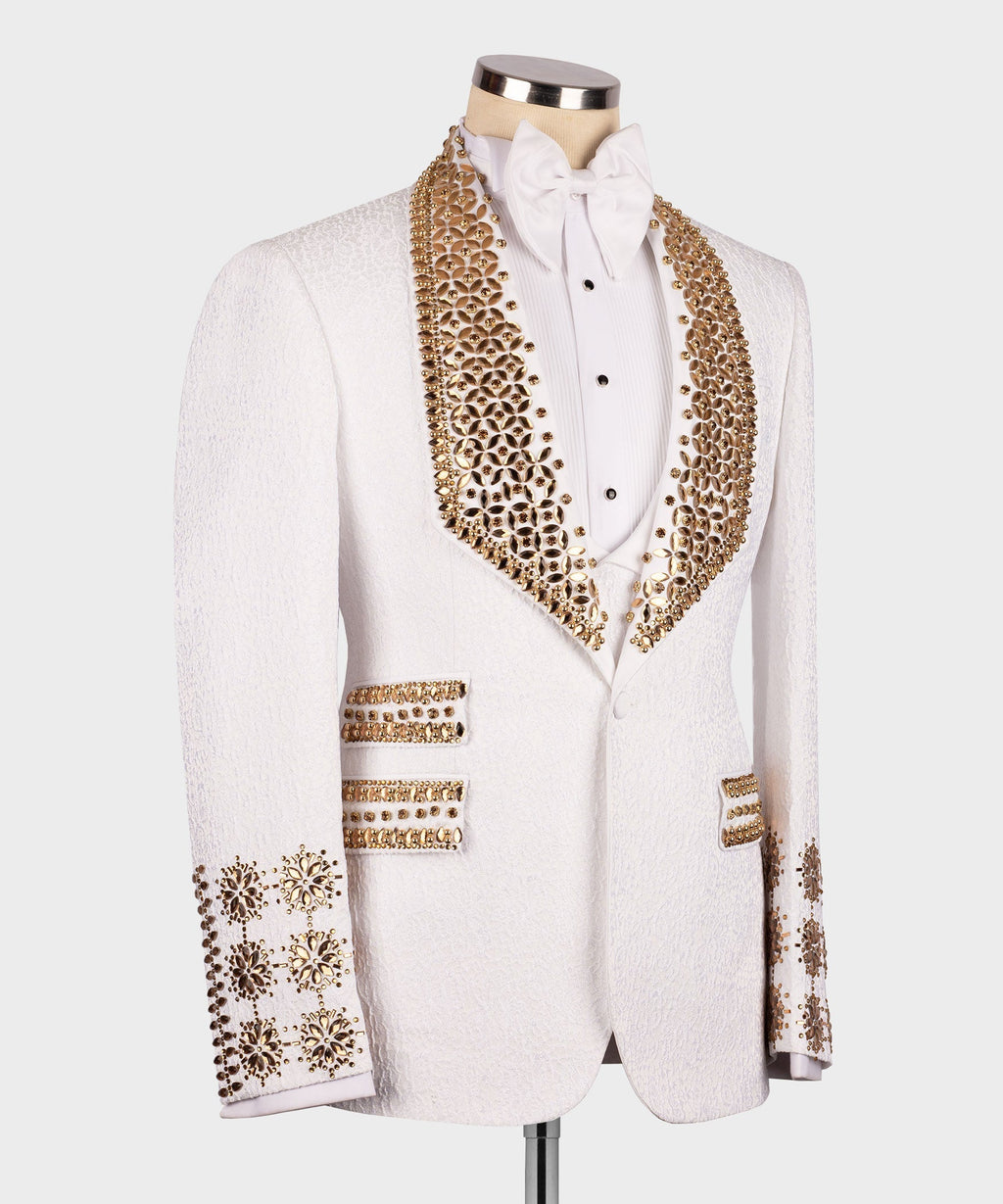 White tuxedo with gold beaded lapel, jeweled cuffs, vest and bow tie