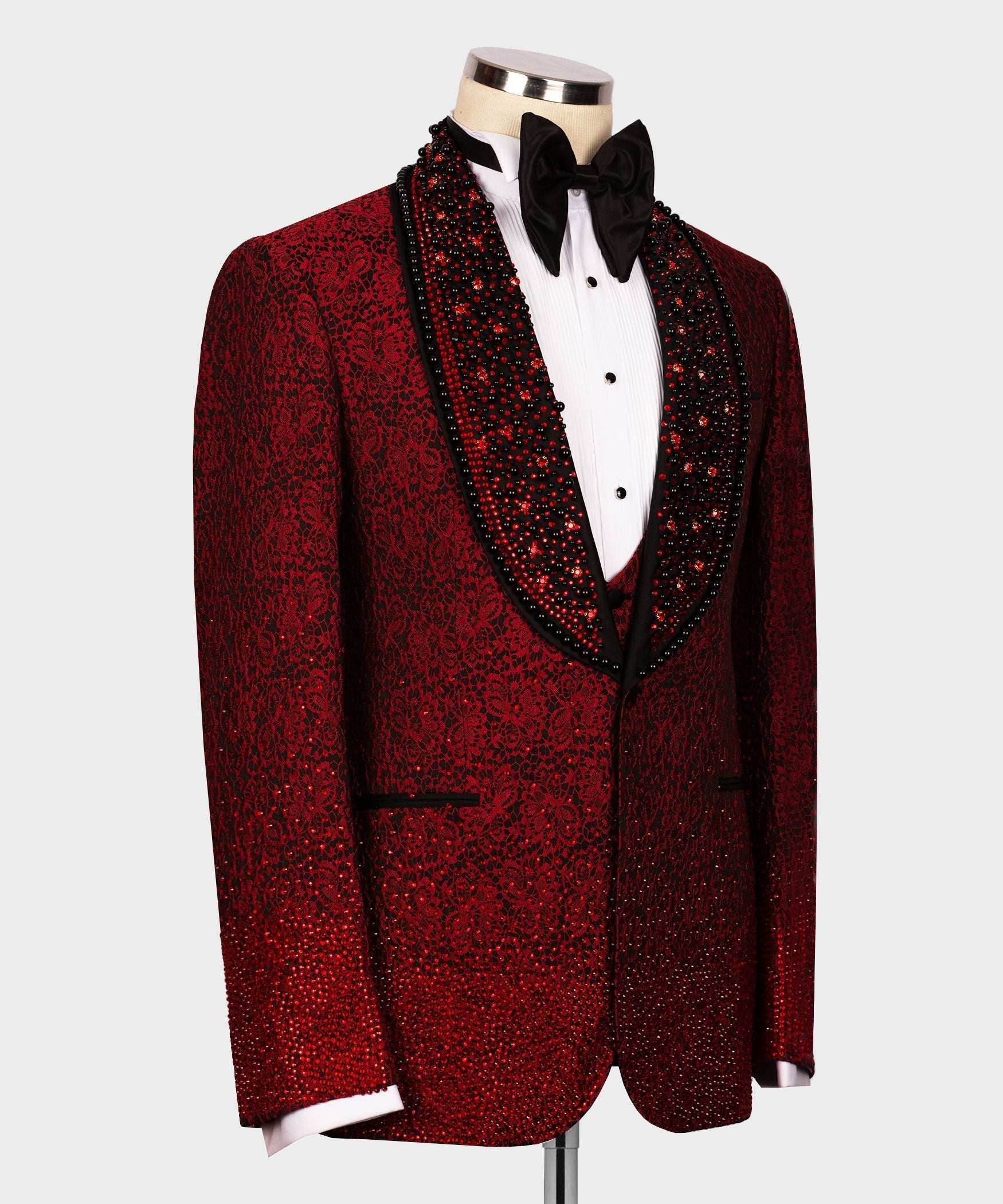 Red patterned sequin tuxedo jacket with black trim shawl collar and buttoned white shirt
