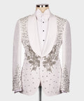 White tuxedo jacket with jeweled floral embellishments, black buttons, vest and bow tie set