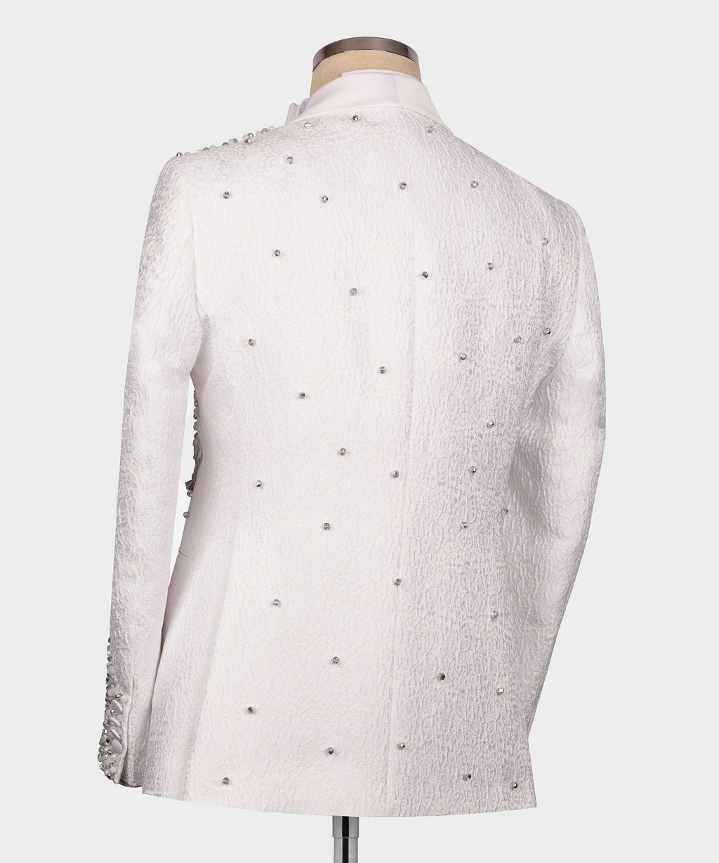 Back view of white tuxedo jacket covered in small rhinestones