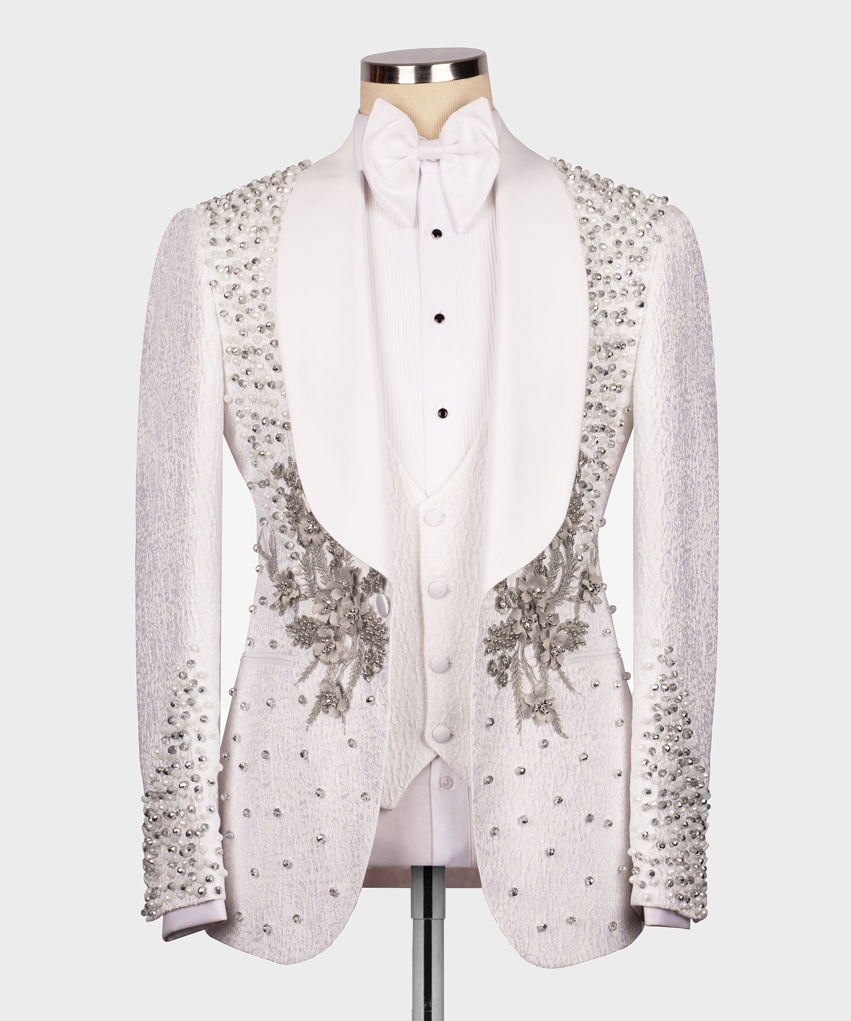 White jeweled floral tuxedo jacket with rhinestone-studded sleeves, bow tie and vest