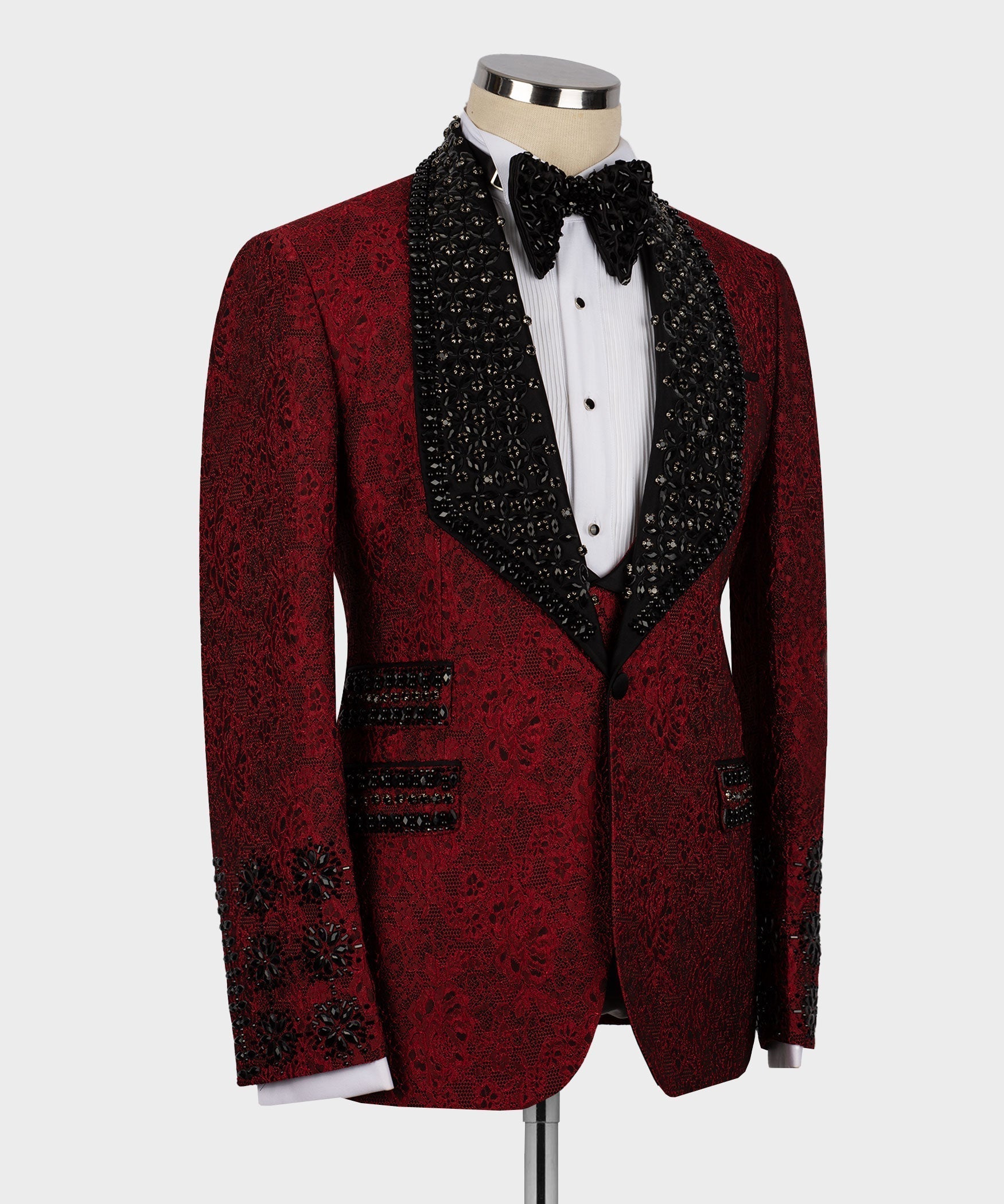 Side view red tuxedo jacket with black lapels and embellished sleeve cuffs