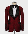 Red custom tuxedo jacket with black patterned satin lapels and bow tie