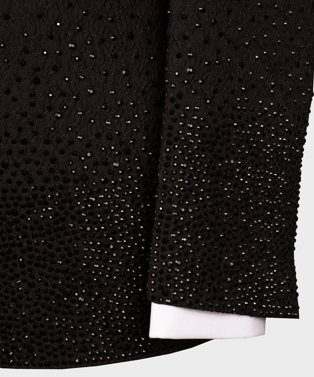 Black tuxedo jacket with dense rhinestone studded fabric panels on the lapel