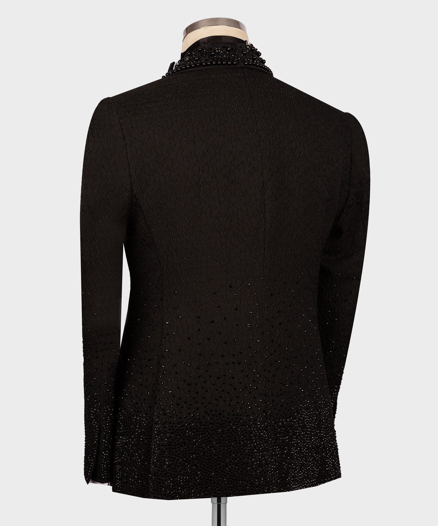 Black tuxedo jacket back view with subtle sparkle pattern
