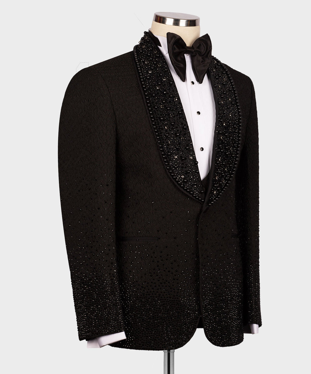 Black tuxedo jacket side view with rhinestone trim along the lapel