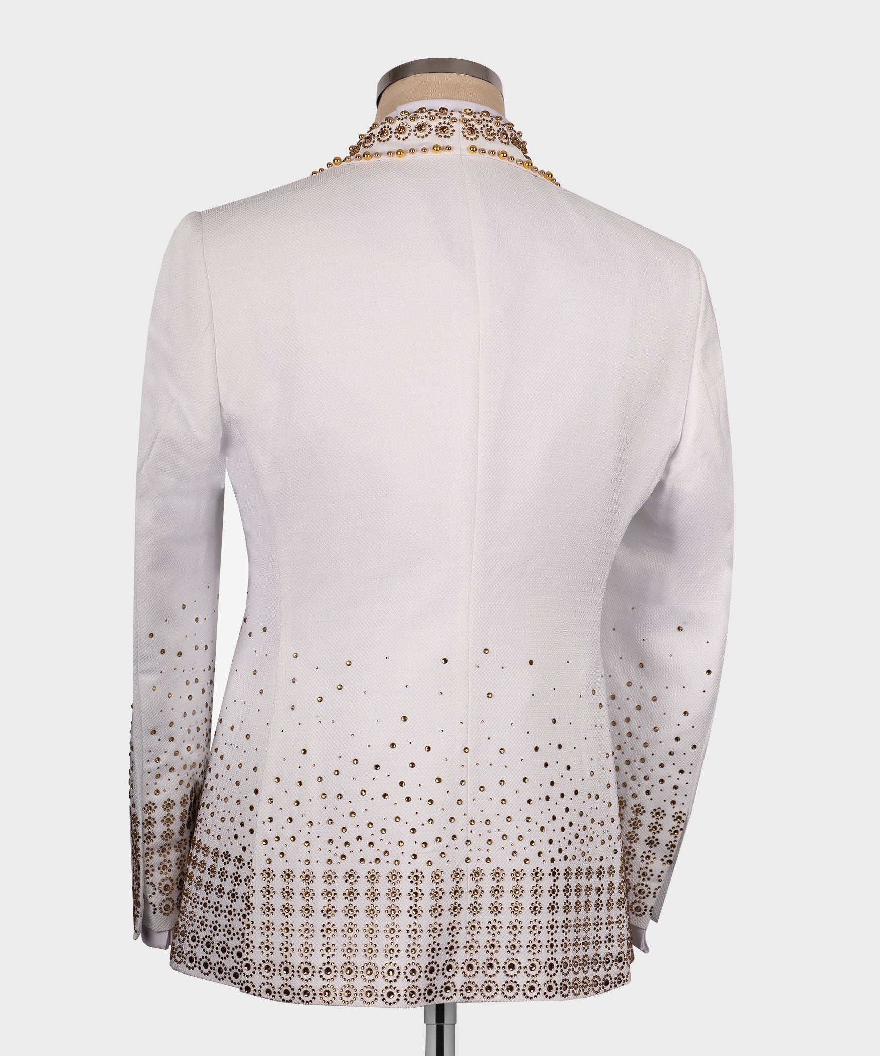 Back view of white tuxedo jacket with gold gem-stone dot and border detailing