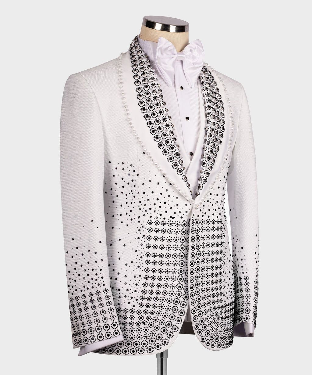 Front view white tuxedo with black beaded detailing, satin bow tie, and buttoned placket