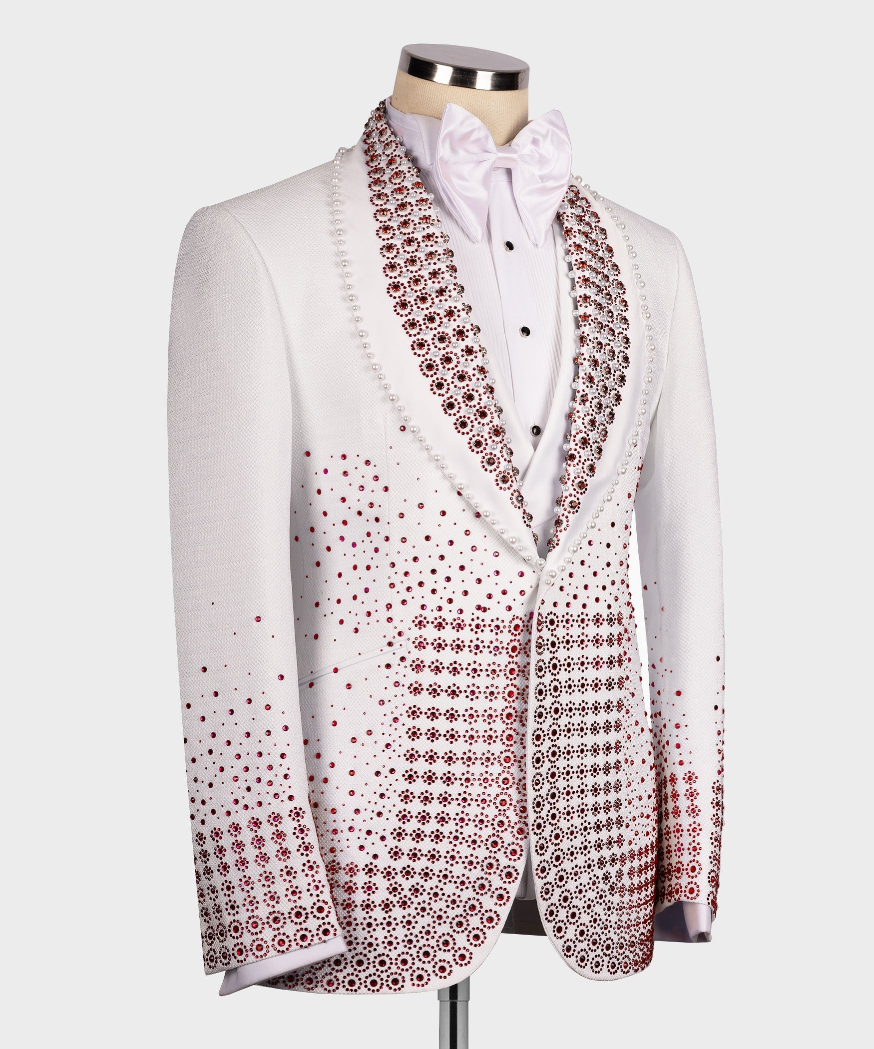 White tuxedo jacket, red beaded gem trim across lapels and front, bow tie