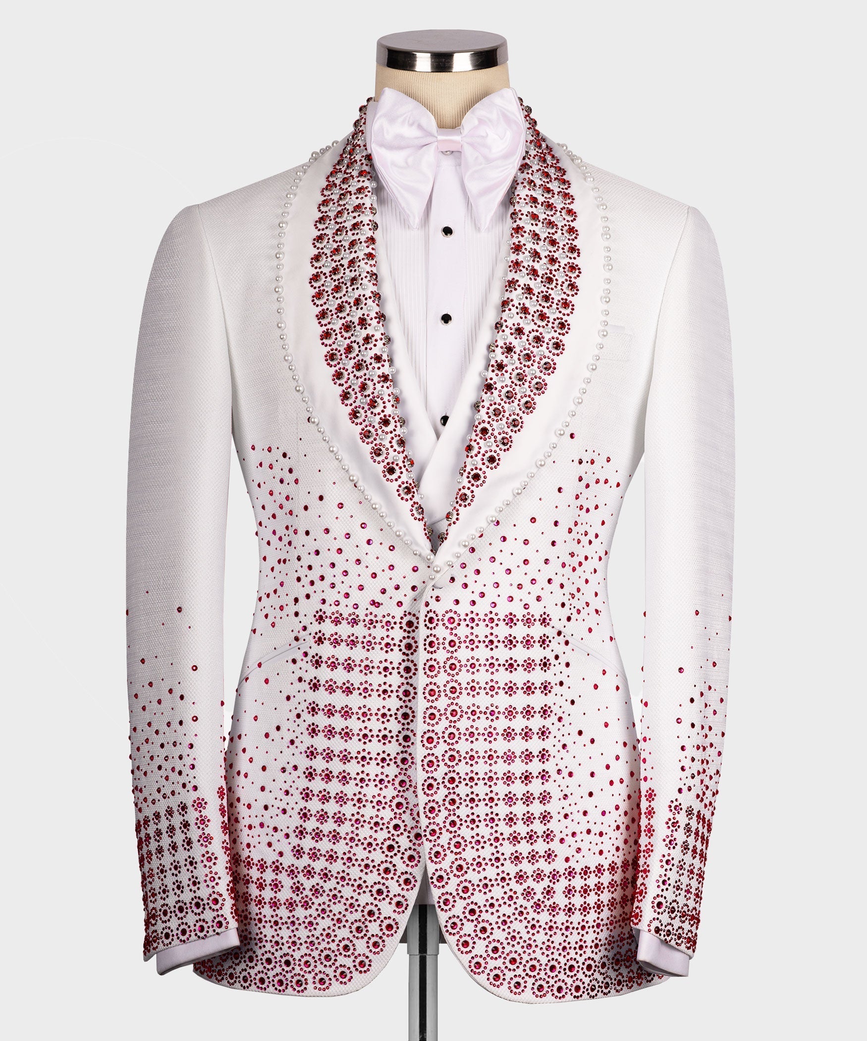 White tuxedo jacket with red gem-style beaded lapels and bow tie detail