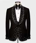Black tuxedo suit: jeweled lapels, embellished waistcoat, black bow tie